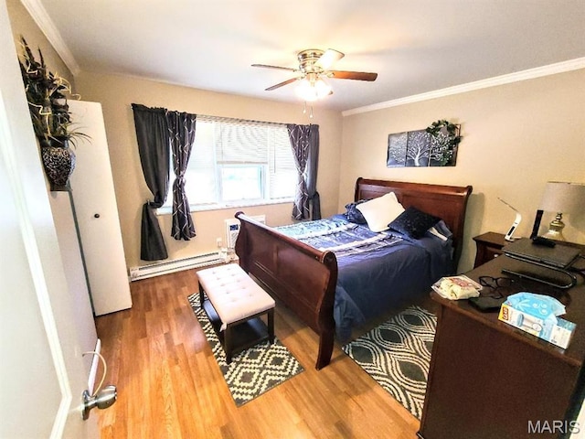 7540 Hazelcrest Dr, Hazelwood, MO 63042 - bedroom featuring baseboard heating, wood finished floors, ornamental molding, and a ceiling fan