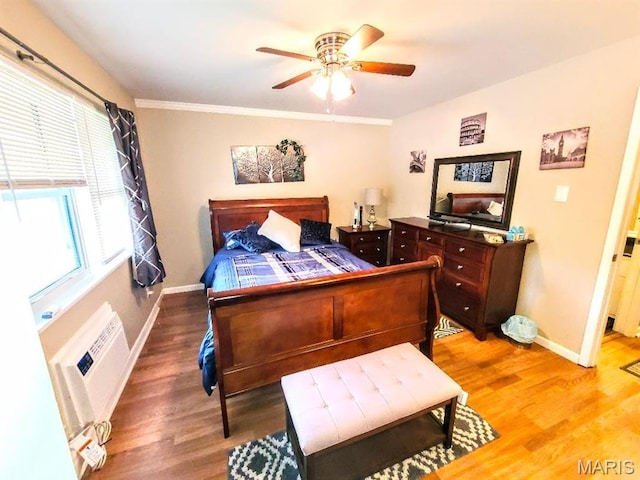 7540 Hazelcrest Dr, Hazelwood, MO 63042 - bedroom with light wood-style floors, an AC wall unit, a ceiling fan, and ornamental molding