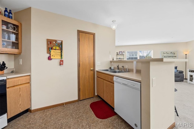 628 Homerun Dr Unit 11N, Ofallon, MO 63366 - kitchen with white appliances, light countertops, glass insert cabinets, and a peninsula