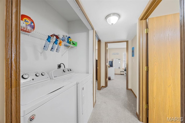628 Homerun Dr Unit 11N, Ofallon, MO 63366 - washroom featuring separate washer and dryer and light carpet