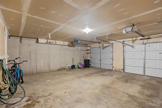 628 Homerun Dr Unit 11N, Ofallon, MO 63366 - garage with a garage door opener