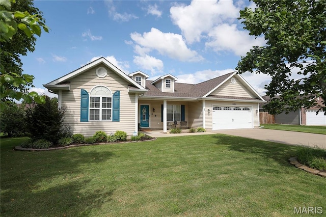 1106 Tulip Trce, Sikeston, MO 63801 - view of front facade with concrete driveway, a garage, a front lawn, and a porch