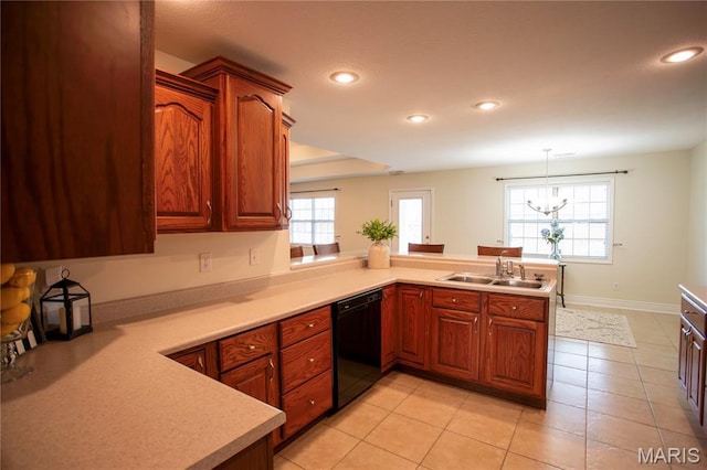 1106 Tulip Trce, Sikeston, MO 63801 - kitchen featuring black dishwasher, a peninsula, light countertops, recessed lighting, and light tile patterned flooring