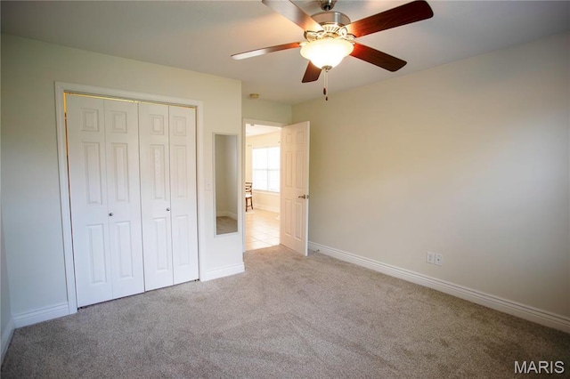 1106 Tulip Trce, Sikeston, MO 63801 - unfurnished bedroom featuring light colored carpet, a closet, and a ceiling fan