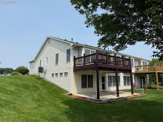 17 Battersea Ct Unit 6B, Ofallon, MO 63366 - rear view of property featuring a patio area, a yard, and a deck