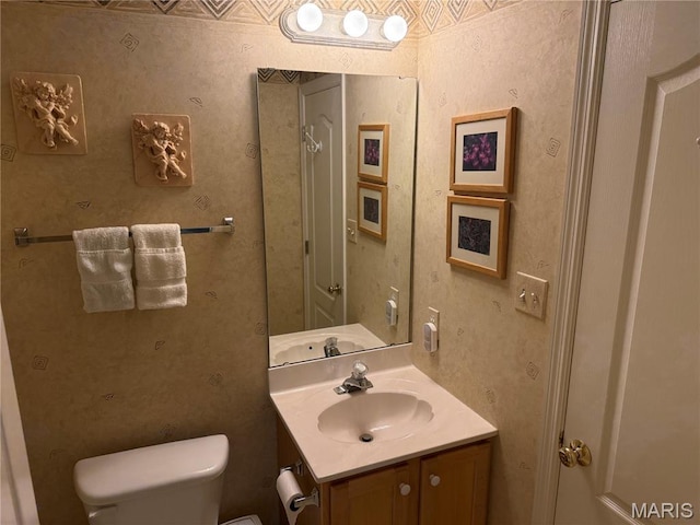 17 Battersea Ct Unit 6B, Ofallon, MO 63366 - bathroom featuring vanity and wallpapered walls