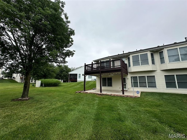 17 Battersea Ct Unit 6B, Ofallon, MO 63366 - back of house with a patio, a yard, and a wooden deck
