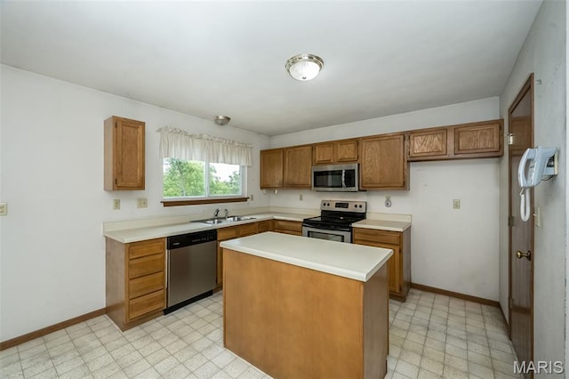 425 Bluffview Hts, Arnold, MO 63010 - kitchen featuring stainless steel appliances, light floors, brown cabinetry, and light countertops