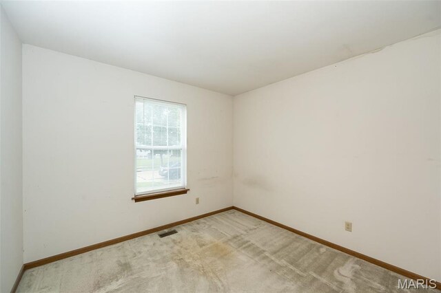 425 Bluffview Hts, Arnold, MO 63010 - empty room with baseboards and light colored carpet
