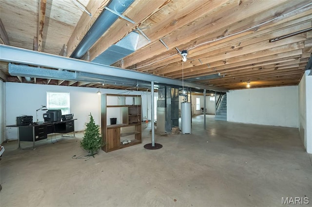 425 Bluffview Hts, Arnold, MO 63010 - basement with gas water heater, stairs, an office area, and heating unit