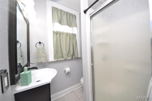 5241 Devonshire Ave, Saint Louis, MO 63109 - bathroom featuring a shower stall, vanity, and tile patterned flooring