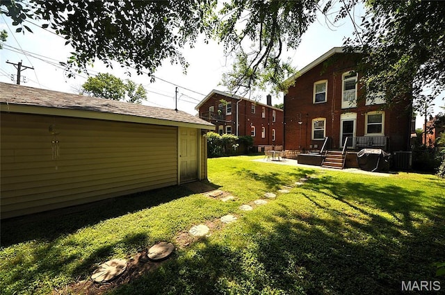 5241 Devonshire Ave, Saint Louis, MO 63109 - view of green lawn with a patio and a wooden deck