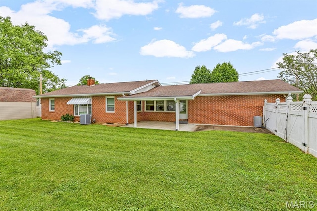 715 S A St, Farmington, MO 63640 - rear view of property featuring a patio area, brick siding, a chimney, and an outdoor structure