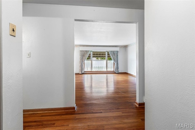 715 S A St, Farmington, MO 63640 - hallway featuring wood finished floors and a textured wall