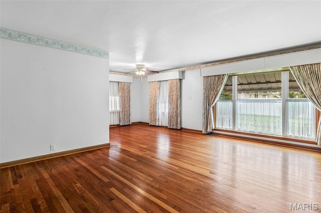 715 S A St, Farmington, MO 63640 - unfurnished room with wood finished floors and a ceiling fan