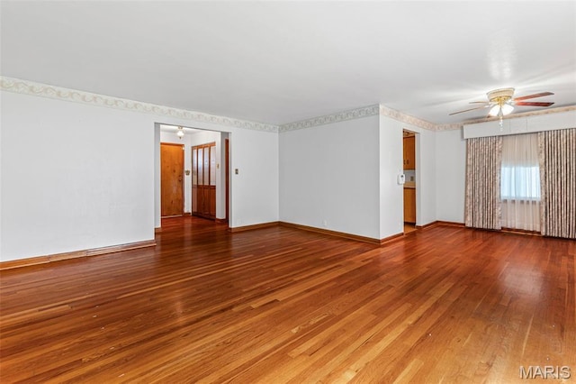 715 S A St, Farmington, MO 63640 - unfurnished room with ceiling fan and hardwood / wood-style floors