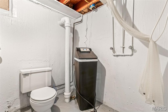 715 S A St, Farmington, MO 63640 - half bath featuring toilet and unfinished concrete floors