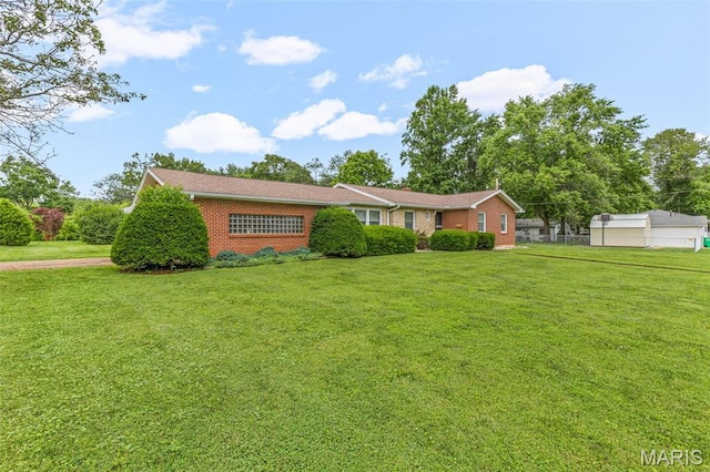 715 S A St, Farmington, MO 63640 - ranch-style home with brick siding and a front lawn