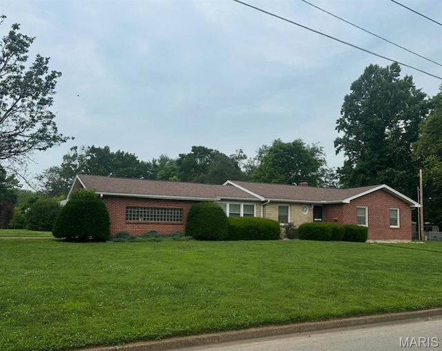 715 S A St, Farmington, MO 63640 - ranch-style house with brick siding and a front yard