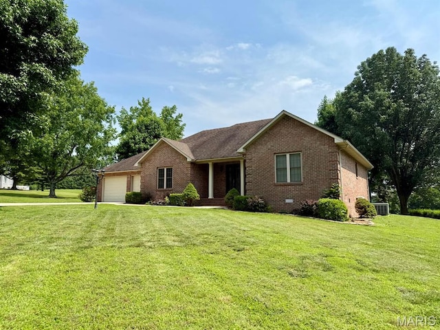 17138 E Cedar Hills Dr, Dexter, MO 63841 - ranch-style home with a garage, brick siding, a front yard, and driveway