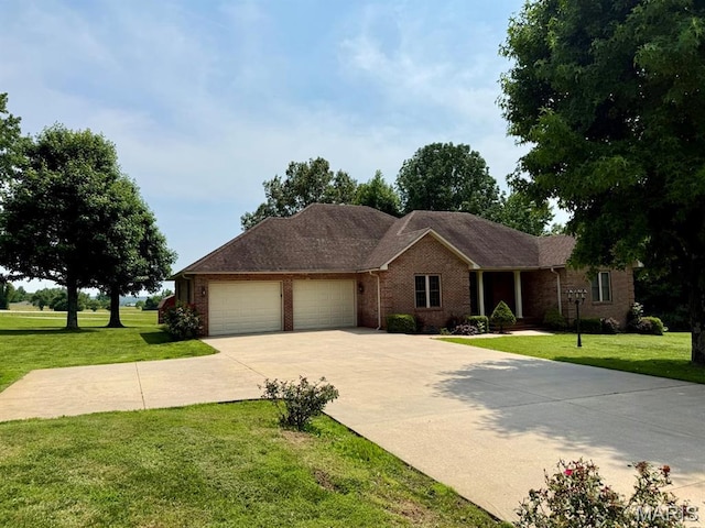 17138 E Cedar Hills Dr, Dexter, MO 63841 - ranch-style house featuring an attached garage, brick siding, concrete driveway, and a front lawn