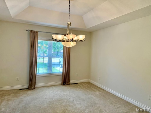 17138 E Cedar Hills Dr, Dexter, MO 63841 - carpeted empty room featuring a chandelier and a tray ceiling