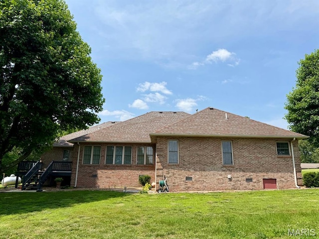 17138 E Cedar Hills Dr, Dexter, MO 63841 - back of property featuring a yard and brick siding