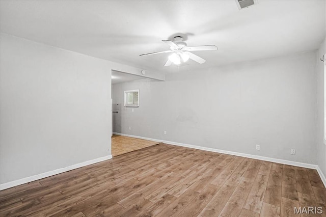 14 Lillian Dr, Belleville, IL 62226 - unfurnished room with a ceiling fan and wood finished floors