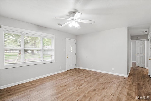 14 Lillian Dr, Belleville, IL 62226 - spare room featuring light wood-type flooring and ceiling fan