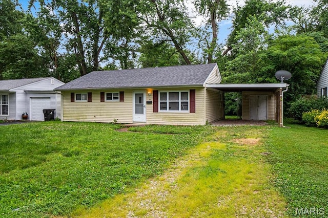 14 Lillian Dr, Belleville, IL 62226 - single story home featuring a garage, a front yard, an outdoor structure, and an attached carport