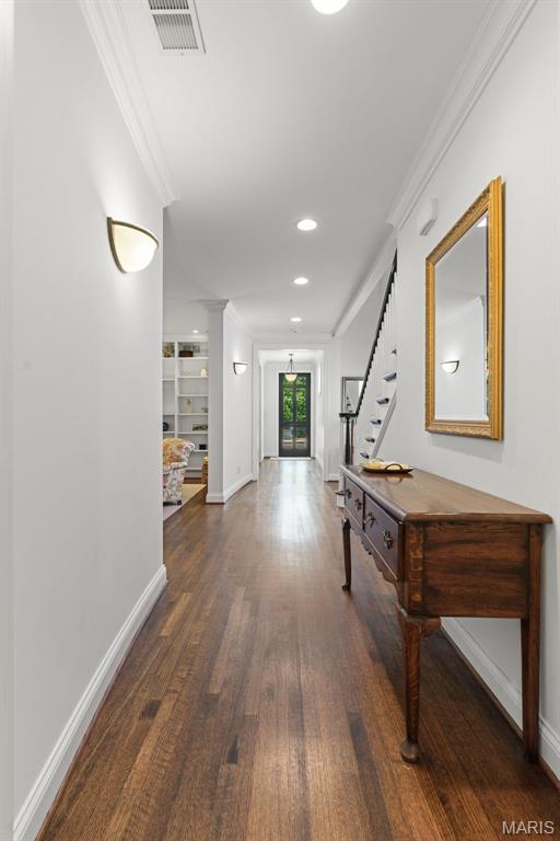 248 Gay Ave, Clayton, MO 63105 - hallway featuring ornamental molding, wood finished floors, stairway, and recessed lighting