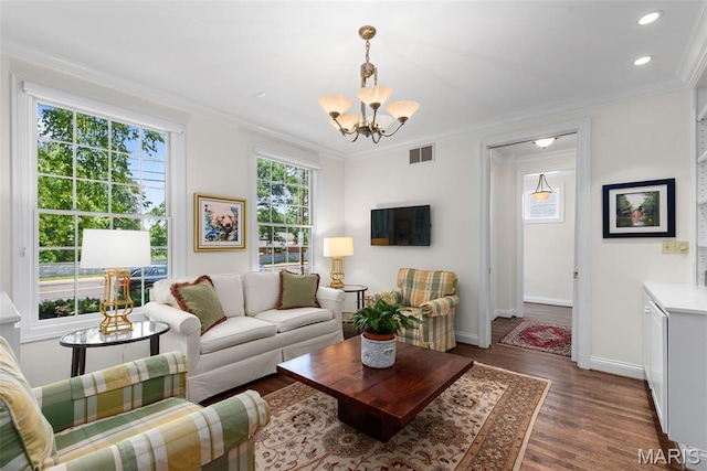 248 Gay Ave, Clayton, MO 63105 - living area with a chandelier, dark wood-style floors, crown molding, and recessed lighting