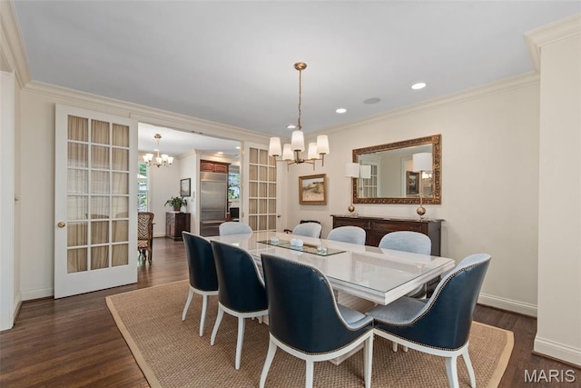 248 Gay Ave, Clayton, MO 63105 - dining area featuring a chandelier, ornamental molding, dark wood-style floors, recessed lighting, and french doors