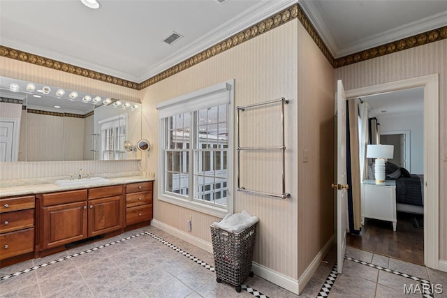 248 Gay Ave, Clayton, MO 63105 - bathroom featuring tile patterned flooring, inlaid floor details, crown molding, and vanity