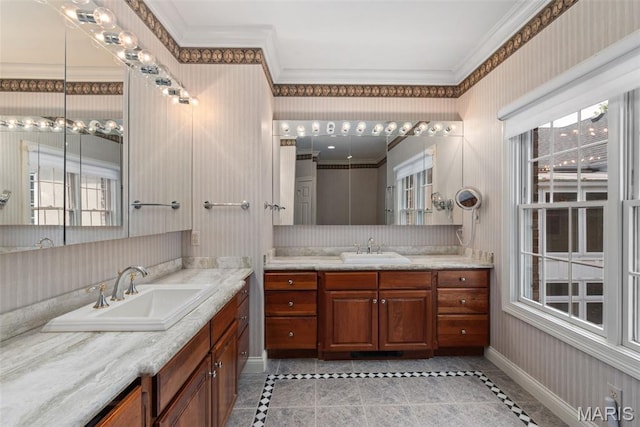 248 Gay Ave, Clayton, MO 63105 - bathroom featuring two vanities, ornamental molding, tile patterned flooring, plenty of natural light, and wallpapered walls
