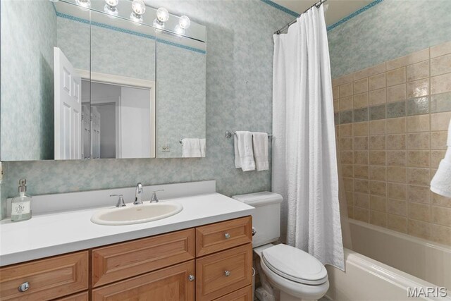 248 Gay Ave, Clayton, MO 63105 - bathroom with vanity, shower / bath combination with curtain, and wallpapered walls