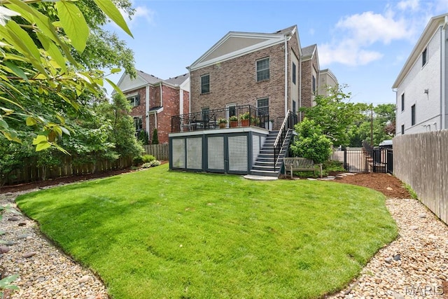 248 Gay Ave, Clayton, MO 63105 - rear view of property featuring stairs, a fenced backyard, and brick siding
