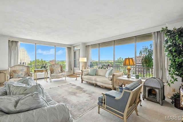 4501 Lindell Blvd Unit 9A, Saint Louis, MO 63108 - living room with a wall of windows and light carpet