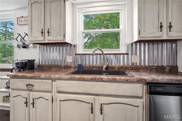 1939 Grandview Dr, Cape Girardeau, MO 63701 - kitchen with dishwasher, dark countertops, and healthy amount of natural light