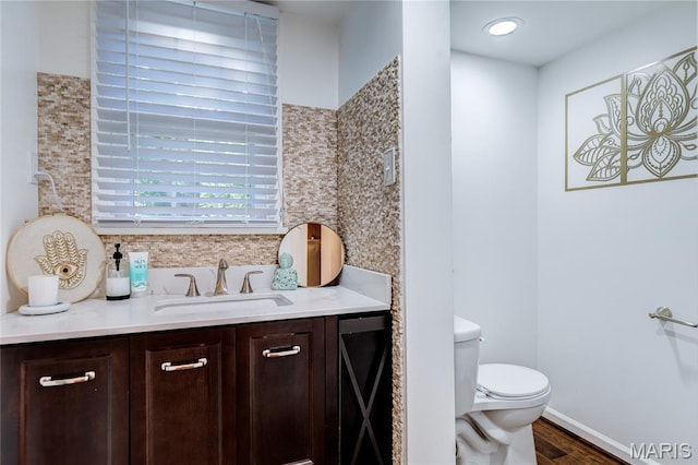 67 Kings Dr, Florissant, MO 63034 - bathroom featuring vanity and wood finished floors