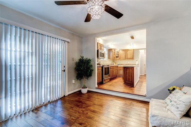 67 Kings Dr, Florissant, MO 63034 - living room with light wood-style floors and ceiling fan