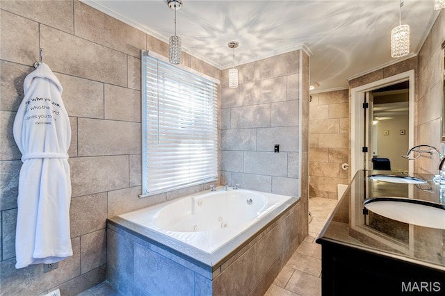 67 Kings Dr, Florissant, MO 63034 - full bath featuring vanity, a jetted tub, crown molding, tile walls, and tile patterned floors