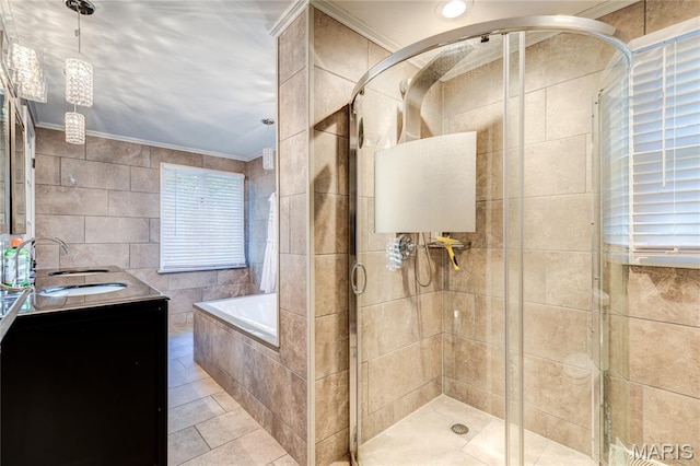 67 Kings Dr, Florissant, MO 63034 - bathroom with tile walls, ornamental molding, a bath, a stall shower, and double vanity