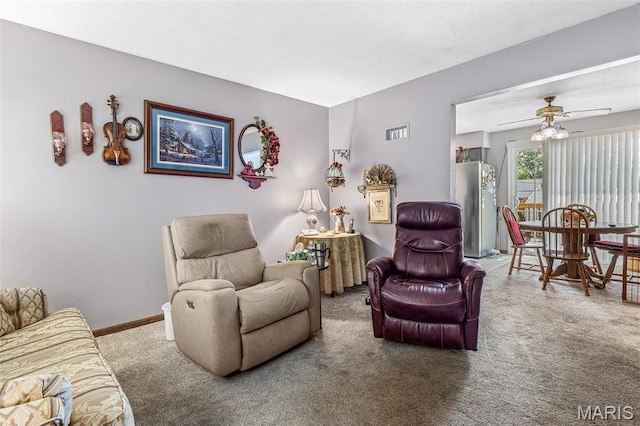 1301 Camillia St, Farmington, MO 63640 - carpeted living room with ceiling fan and baseboards