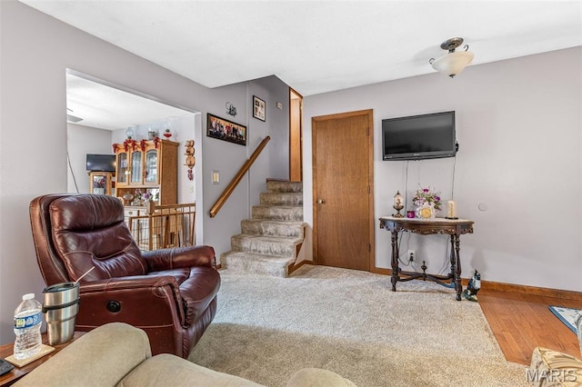 1301 Camillia St, Farmington, MO 63640 - living area featuring stairway and wood finished floors