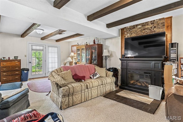 1301 Camillia St, Farmington, MO 63640 - carpeted living area featuring beamed ceiling and a large fireplace