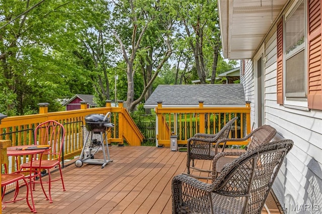 1301 Camillia St, Farmington, MO 63640 - deck with view of wooded area and grilling area
