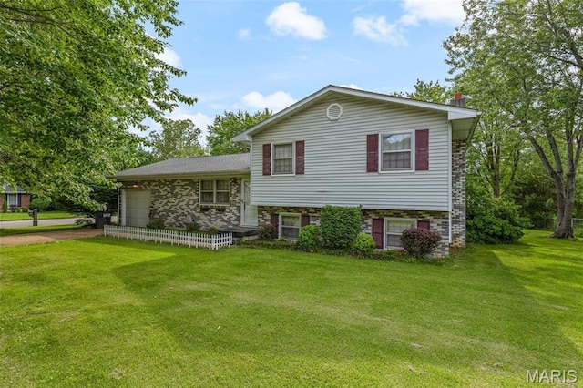1301 Camillia St, Farmington, MO 63640 - split level home with a garage, a front yard, and concrete driveway