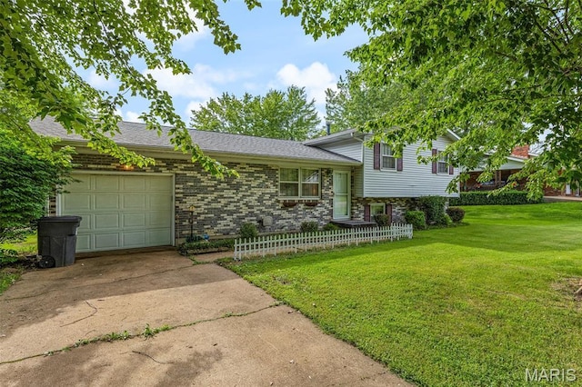 1301 Camillia St, Farmington, MO 63640 - tri-level home with an attached garage and driveway