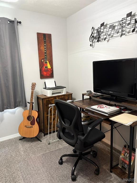 422 W Dover St, Monroe City, MO 63456 - carpeted home office featuring baseboards